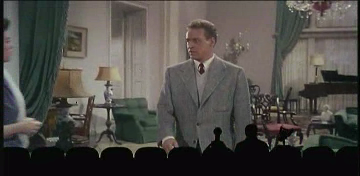 Screenshot of MST3K The Movie, watching This Island Earth, as Rusell Johnson appears on screen.